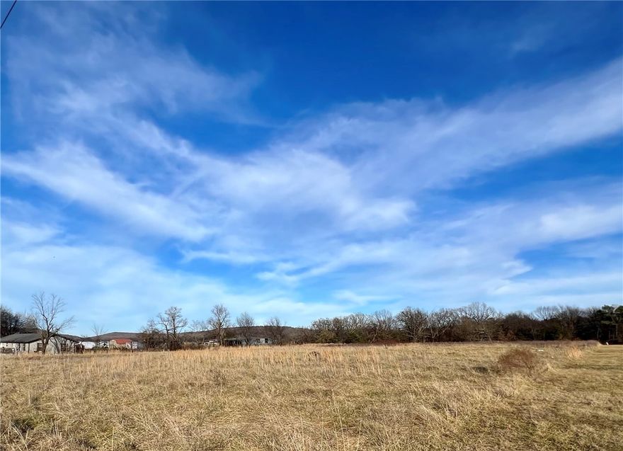 Gorgeous 3.42 +/- flat acres with over 200 ft of highway frontage for UNDER $100k. Ready for your dream home in the country! Electric on site. Perc available.