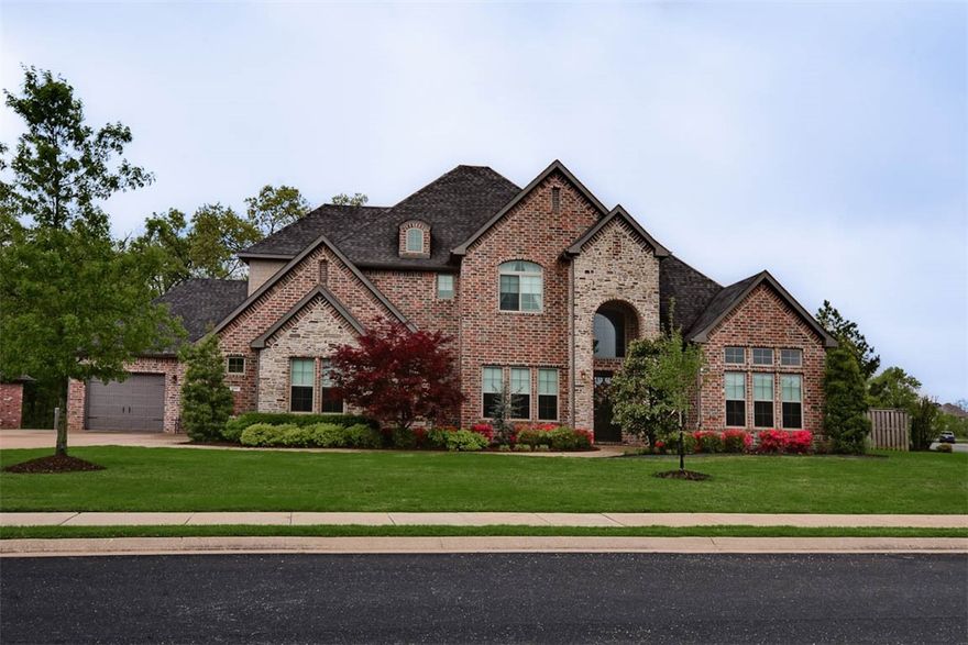 Hard to find, immaculate, quality home, located on a private .61 acre corner lot in desired, gated Oak Tree. Downstairs features two bedrooms with 2.5 baths, office, & inviting living space.  The kitchen boasts full size side by side Fridge/Freezer combo, double ovens, microwave drawer, gas cooktop, pot filler, & large island for entertaining. Full Pantry and Butlers pantry features wine fridge. Spacious laundry room w mud/room with easy garage access. Expansive full tile shower including rain head shower in master bath. Storm shelter & upgraded lighting throughout the beautiful home! Upstairs features two very spacious bedrooms with 2 baths, plus bonus room w/ wet bar & media room. Excellent location, with a large, private backyard which backs up to a neighborhood amenities, with newly added outdoor kitchen, fire pit and sitting wall, rubber mulch area for your playset, and nice storage building. Oak Tree is a gated neighborhood featuring a clubhouse, fitness center, pool, and tennis/basketball courts.