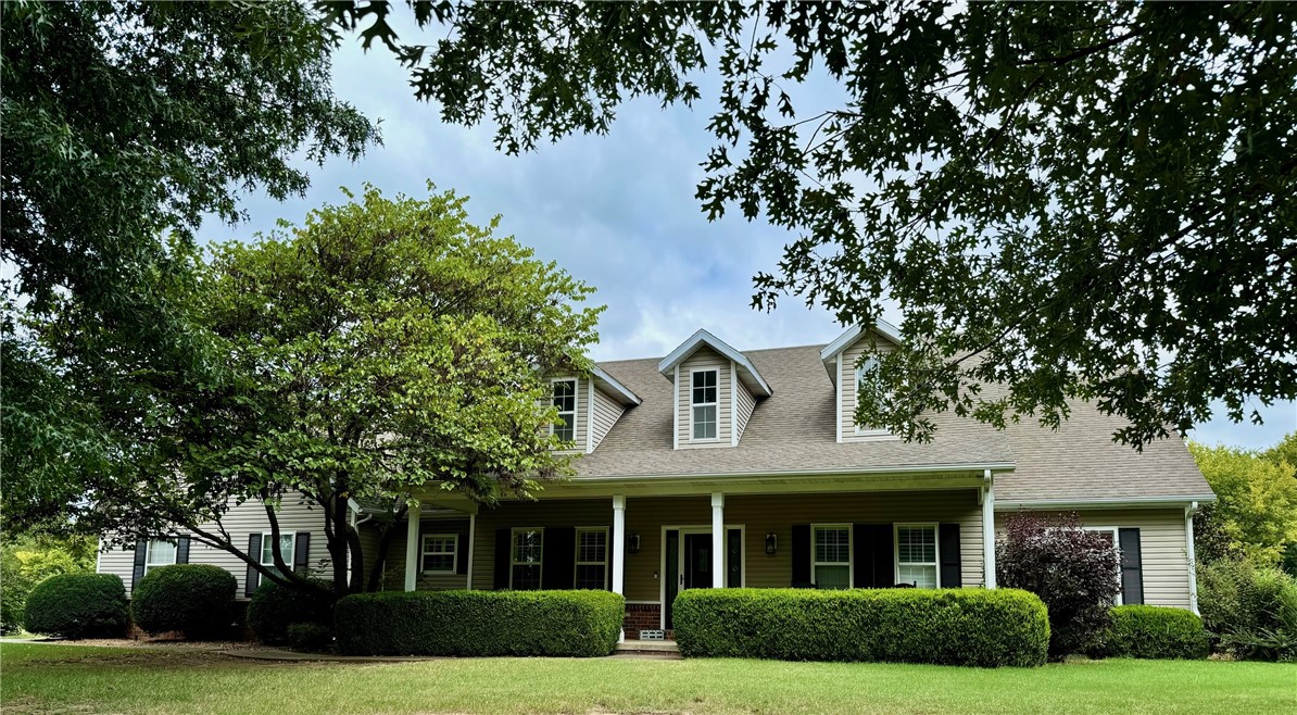 Immaculate 4 BR, 3 BA, 2767 SF (main floor 2419, upstairs bonus room 348 SF) home on cul-de-sac. Close to schools, town amenities, minutes from I-49. Over-the-top home on 1.5 +/- AC w/landscaped, mature trees w/22x22 shop, 426 SF pool/guest house, inground pool surrounded w/iron fencing, 2 car attached garage w/storage closet. Home has many amenities, custom cabinetry, built-ins, custom trim package throughout house w/lovely hardwood flooring, tile in wet areas, carpet in office. Spacious & open flow of the floor plan allows for easy entertaining inside & out. There are numerous covered &/or screened porches to enjoy company. Oh! They have their own private guest pool house to enjoy w/open kitchen & living room w/gas log stove along w/central H/A, private BR & BA. Great hangout on pool days, too! Main house has a beautiful gas log fireplace, granite kitchen countertops, plenty of storage space, walk-in closets, linen closets, office, laundry, utility room & 4th BR has ensuite bathroom. This is a must see home.