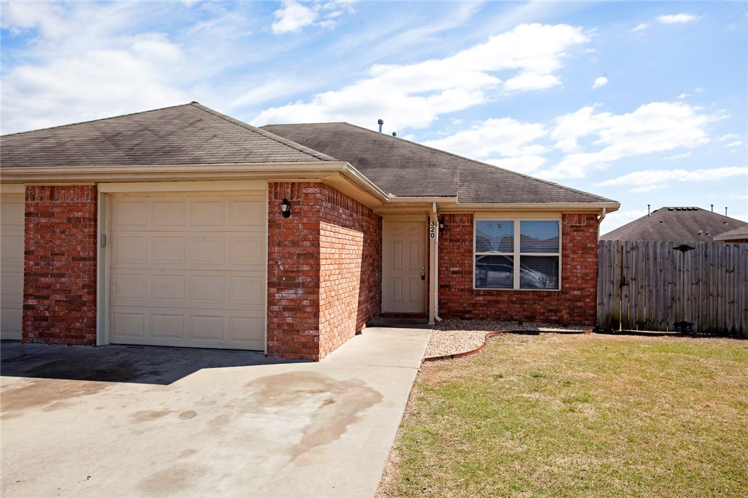 Great 3 bedroom 2 bath duplex in Rogers. Open floor plan, fresh paint, fenced yard.
