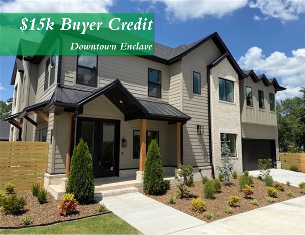 **SUMMER SPECIAL, BUYER RECEIVES A $15K CREDIT TO HELP BUY DOWN INTEREST RATE OR APPLY TO CLOSING COST** Welcome to The Enclave at Bella Vista Roadāa beautiful collection of four custom homes on a private drive in north downtown Bentonville. This residence blends refined style with modern comfort, featuring a soft color palette, brushed gold accents, designer lighting, and matte-finished white oak floors. The living area centers around a cozy fireplace flanked by custom glass-paneled cabinetry. The main-level primary suite offers a paneled feature wall and a spa-inspired bath with onyx pendant lights, marble-veined tile, dual shower heads (including rain head), and seamless glass. Upstairs includes a large family room, two bedrooms with a Jack & Jill bath, a secondary suite, and a flexible fifth bedroom or office. Outdoor living is elevated with a covered front porch, open patio, grilling terrace, and a fully fenced, landscaped yard. Discover timeless luxury just moments from the best of Bentonville.