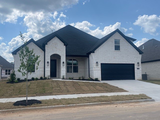 Sold before print! The charming Cooper Bonus plan in Henderson Park, located in Fayetteville! The Cooper Bonus plan has 2600 square feet with 4 bedrooms, 3 baths. 4-sided brick. 2-inch blinds throughout! Use the 4th BR as a Study! This plan also includes a game room on the second floor with a full bath and a Walk-in closet so this can be used as an extra bedroom. These homes will be 4-sided Brick. Flooring is Wood Laminate plank flooring and carpeting in the secondary bedrooms! The Kitchen will have an oversized kitchen island, quartz countertops and 42-inch upper cabinets with top molding with an Upgraded Stainless steel appliance package. The Living room will have a Beautiful Gas Fireplace. LED lighting throughout! Ceiling fans! High efficiency air conditioner system with Programmable WI-FI thermostat! Tankless hot water heater! Bedroom one will have double sinks, oversized walk-in shower, and a SOAKING TUB!! Covered Patio! Gutters included! Springdale Schools. Taxes TBD.