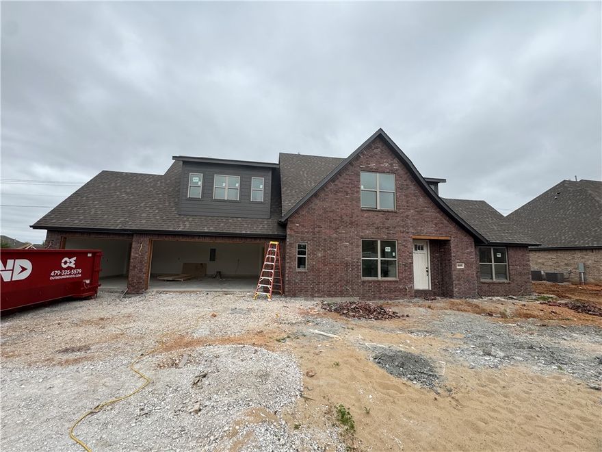 Check out this new construction 4-bedroom, 3 full bath home with flex space just a hop, skip, and a jump from the Greenway and a stone's throw from the community pool and playground. The home includes features like 3 cm quartz counter tops throughout, custom cabinets with soft close drawers/doors, Frigidaire Gallery appliances (cooktop vented to the exterior, & wall oven/microwave), custom powder coated handrails on the stairs, tiled shower surrounds in the two full bathrooms, custom mirror frames, low-e windows, fence, blinds, gutters, & an irrigation system.  Did I mention you can pick colors if they're available. We have some preferred lender incentives with local lenders up to $5,000 as well. All of this is just minutes from fine dining, entertainment, shopping, and all of the amazing things Northwest Arkansas has to offer.