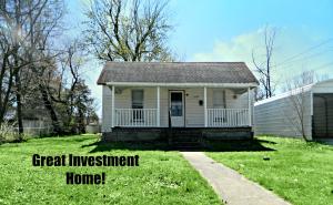 Invest in Real Estate! This would be a great first home or investment property. Cute possibilities and ready to go! Until placed on the market this home was being rented for $550.00 per month. Great corner lot, nice yard with large trees and covered parking this little treasure is ready to work for you!