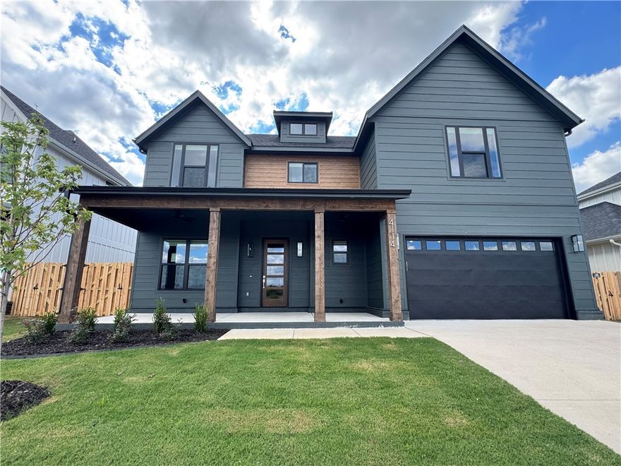 Welcome to Meadow Brook in SW Rogers! Great community in the best location! This plan features 3-4 bedrooms (2 flex spaces either bedroom 2 or study option as well as upstairs bedroom 4 or bonus room). All bedrooms have walk-in closets with plenty of storage! Downstairs you will find the primary bedroom. Great layout with open kitchen/living room area. Kitchen has large island to sit up to 6 bar stools, built-in gas cook top, built-in oven and microwave, large pantry, and eat in dining area. Primary bedroom feature en suite bathroom with soaking tub, walk-in shower, his and hers separate vanities, and large closet with lots of built-ins. Bedrooms 2, 3 & 4/bonus room are upstairs along with2 full bathrooms. Enjoy the evenings grilling on the covered back patio! Can't beat location being only minutes to shopping, dining, groceries stores, and only steps to the Razorback Greenway Trail.