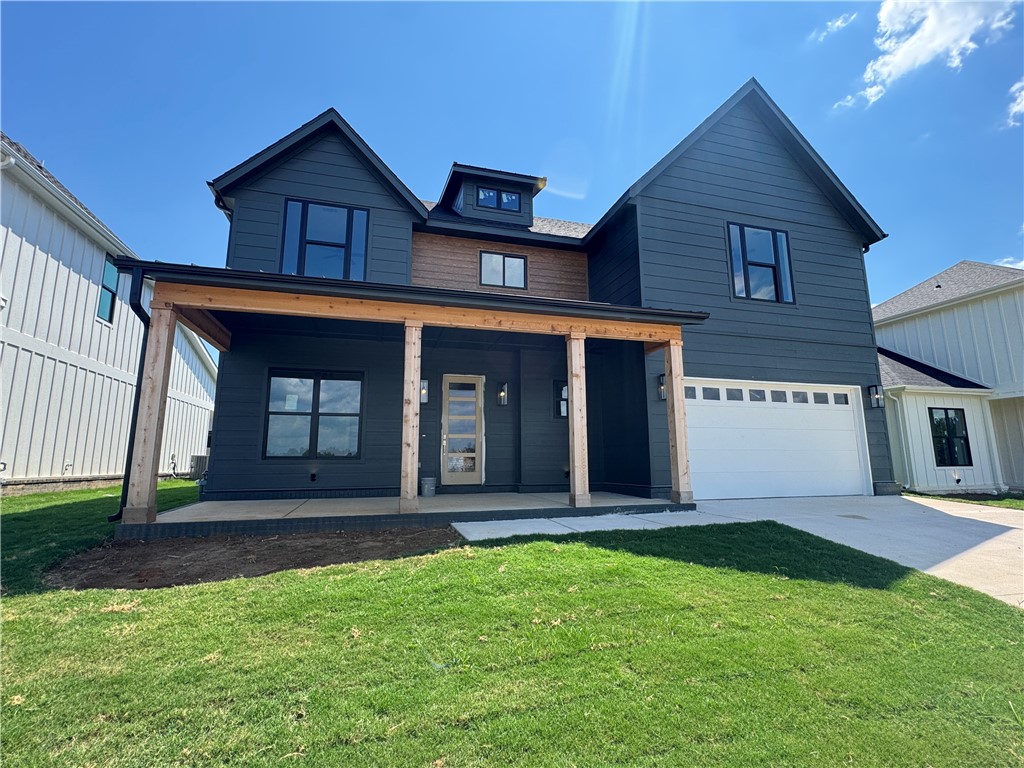 Welcome to Meadow Brook in SW Rogers! Great community in the best location! This plan features 3-4 bedrooms (2 flex spaces either bedroom 2 or study option as well as upstairs bedroom 4 or bonus room). All bedrooms have walk-in closets with plenty of storage! Downstairs you will find the primary bedroom. Great layout with open kitchen/living room area. Kitchen has large island to sit up to 6 bar stools, built-in gas cook top, built-in oven and microwave, large pantry, and eat in dining area. Primary bedroom feature en suite bathroom with soaking tub, walk-in shower, his and hers separate vanities, and large closet with lots of built-ins. Bedrooms 2, 3 & 4/bonus room are upstairs along with2 full bathrooms. Enjoy the evenings grilling on the covered back patio! Can't beat location being only minutes to shopping, dining, groceries stores, and only steps to the Razorback Greenway Trail.
