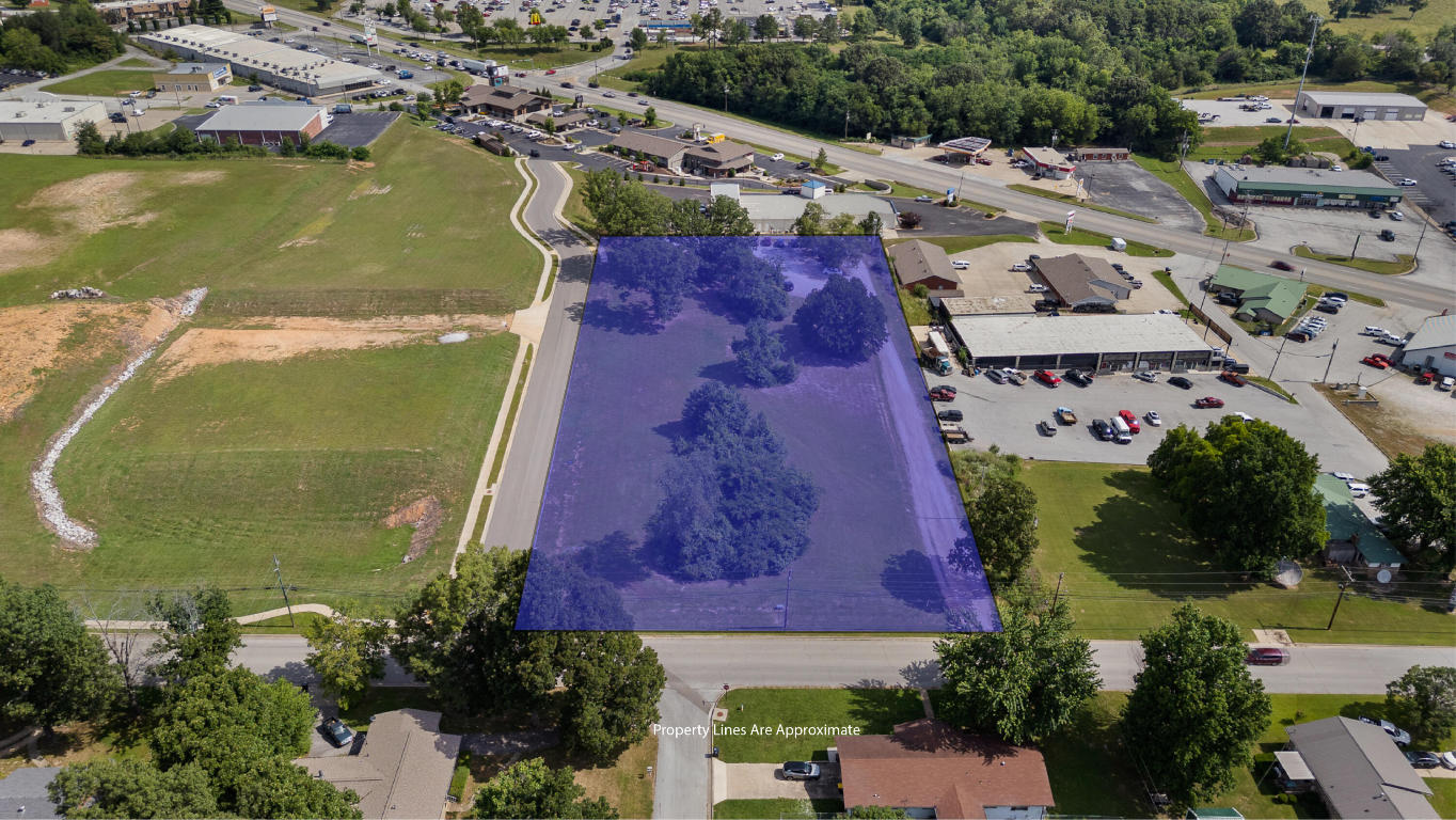 2.7 acres zoned C-3, all utilities available. Also listing as single lots