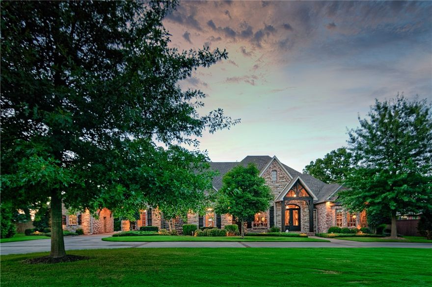 Welcome home to your own personal retreat!  The home is an award winning design with custom touches that are timeless.  The burl wood cabinets and stone fireplace create a warm inviting atmosphere.  Four bedrooms with three and a half baths on the main level.  The second level consists of a flexible space that could be the fifth bedroom or a bonus room with an attached full bath.  The backyard is an oasis with the saltwater pool and spa.  The detached pool house has a full outdoor kitchen, wood burning fireplace, dining area, living area and full bath.  The potting shed is great for storage for yard equipment and lawnmower or could be used as a workshop.  Both the front and backyard have extensive landscaping including large trees for the ultimate privacy.  There is an irrigation system for both the front and back yard.  The single bay garage has a tornado shelter located inside.  Centrally located in Northwest Arkansas with easy access to I49.