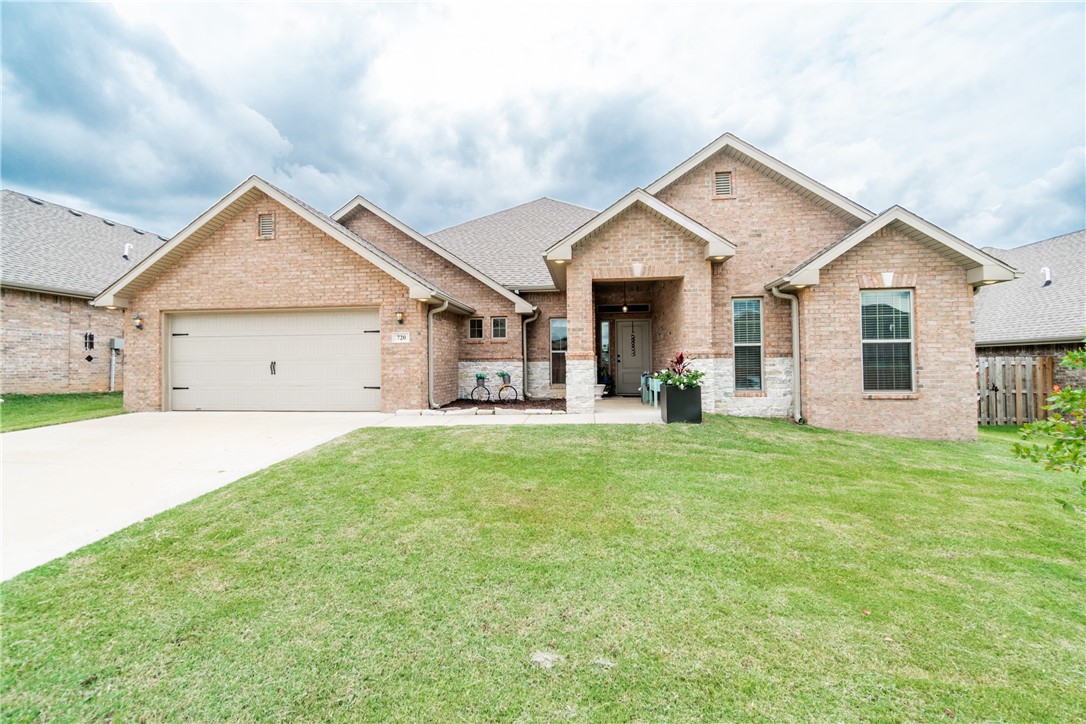 Built in 2020, this one-owner home in Centerton offers modern living with a great view of the pond from the backyard. With 4 bedrooms, 3 baths, and 2,568 sqft, this home features a split floor plan and a formal dining room. The master suite includes his and her closets, with "her" closet conveniently opening to the laundry room. Enjoy cooking with stainless steel appliances and cozy up to the electric fireplace in the living room. The fridge is included. Located in the Bentonville School district and just 10 minutes from Coler Mountain Bike Trail, this home has it all!
