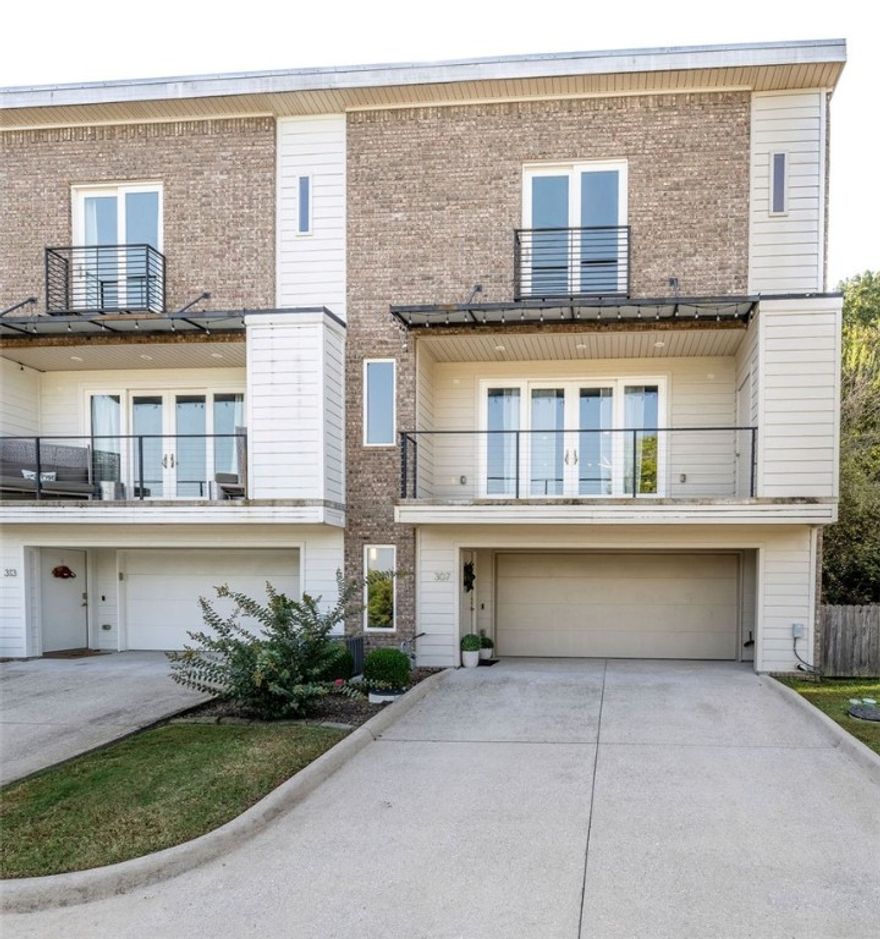 Game day incentive! Now enjoy a $15,000 Buyer incentive with acceptable offer.  Contemporary executive townhouse with a million-dollar view!
This beautifully appointed 3-bedroom, 2.5-bath home offers modern comfort and convenience, featuring a covered balcony, a spacious two-car garage, and smart security features you can access from anywhere.
Inside, hardwood floors, granite countertops, a double pantry, and stainless steel appliances create a stylish and functional kitchen and living space. Enjoy the fresh feel of brand-new paint, new carpet, and the three storage closets with more than enough space for activity equipment- to bike, for game day, and more! 
The yard and exterior are fully maintained by the POA, offering low-maintenance living with a view you truly have to see to believe.
Don’t miss your chance to own a slice of NWA living—call today!