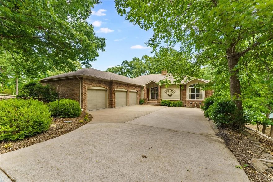 Lakefront living at its finest! This 4 bedroom, 3 bath home on beautiful Loch Lomond offers the perfect blend of luxury and convenience. Custom cabinetry runs throughout the home, complemented by rich hardwood flooring and thoughtfully designed living spaces. Enjoy serene lake views from the screened porch, or follow the gentle slope down to your private, covered boat dock with boat lift—perfect for days on the water. An oversized 3-car garage provides ample storage for vehicles, lake gear, or hobbies. Ideally located with easy access to all that Bella Vista has to offer, this is the lake retreat you’ve been waiting for!