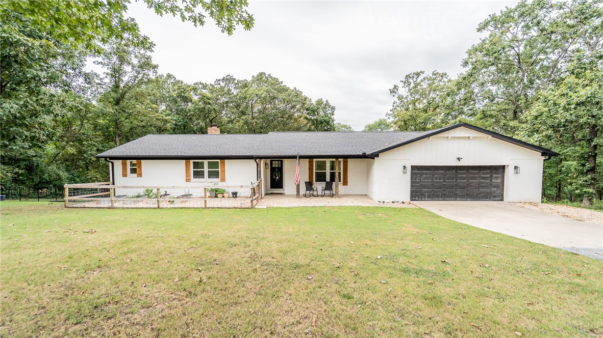2 Acres with a Fully Remodeled Home!
This one-of-a-kind property won’t last long! Nestled on 2 peaceful acres, it offers quiet living with Arkansas wildlife right in your own backyard.
The main level features 2,009 sq. ft. of beautifully remodeled living space, fully updated in 2023. Recent upgrades include a new water heater (2023) and furnace (2024). The basement provides 1,318 sq. ft. of finished space with heating and air, plus an additional 326 sq. ft. unfinished—perfect for storage. Whether you envision a man cave, extra bedrooms, or a custom entertainment area, the possibilities are endless.
Step out back to a spacious deck with both open-air and screened-in sections—ideal for morning coffee or evening sunsets. Don’t miss your chance to own this true slice of tranquility!