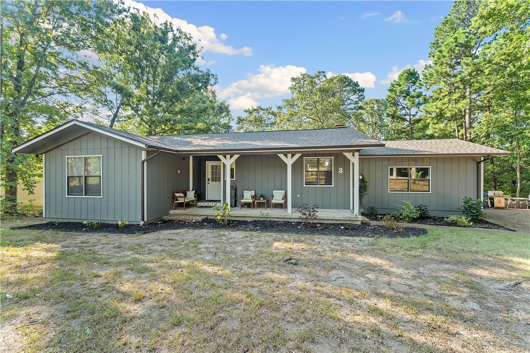 Nestled in the trees of Bella Vista, this updated 3-bedroom, 2-bath home is a nature lover's dream and a cyclist's paradise. With the Back Forty Trail right out your back door, adventure starts the moment you step outside. Inside, you'll find a stylish updated home with modern finishes, a bright open layout, and two levels of living space perfect for relaxation or entertaining. Whether you're enjoying quiet mornings surrounded by nature, hosting friends after a day on the trails, or simply soaking in the peaceful settings, this home offers the best of Northwest Arkansas living. The neighbors are wonderful, and the area is quiet. Don't wait, this won't last.
