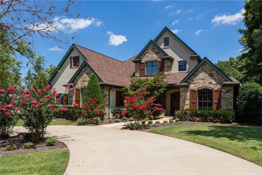 STUNNING & well maintained home in highly sought after gated golf community of Clear Creek. Timeless European elegance with traditional features, this custom home boasts beautiful cherry floors throughout, soaring beamed ceilings, formal dining w/coffered ceiling, wine closet/wet bar, Office with custom built-ins, & a NEW roof in 2020. Elegant kitchen has custom cabinetry, & gas stove with brick surround, large granite island & eat-in dining. Enjoy the luxurious comforts of the exquisite Owner's suite with door to screened-in porch, & a private bath with HUGE jetted tub, walk-in closet, custom double vanity, & a unique walk-thru shower. Media room with gas fireplace is well situated for effortless entertainment. Upstairs you'll find additional bedrooms & baths & a large game room w/wet bar to accommodate guests & family. Screened in porch overlooks a stone patio, all nestled on .85 acre lot. Oversized 2 car garage, 1 car garage with mini split A/C plus golf cart garage. Don't miss this one owner masterpiece!