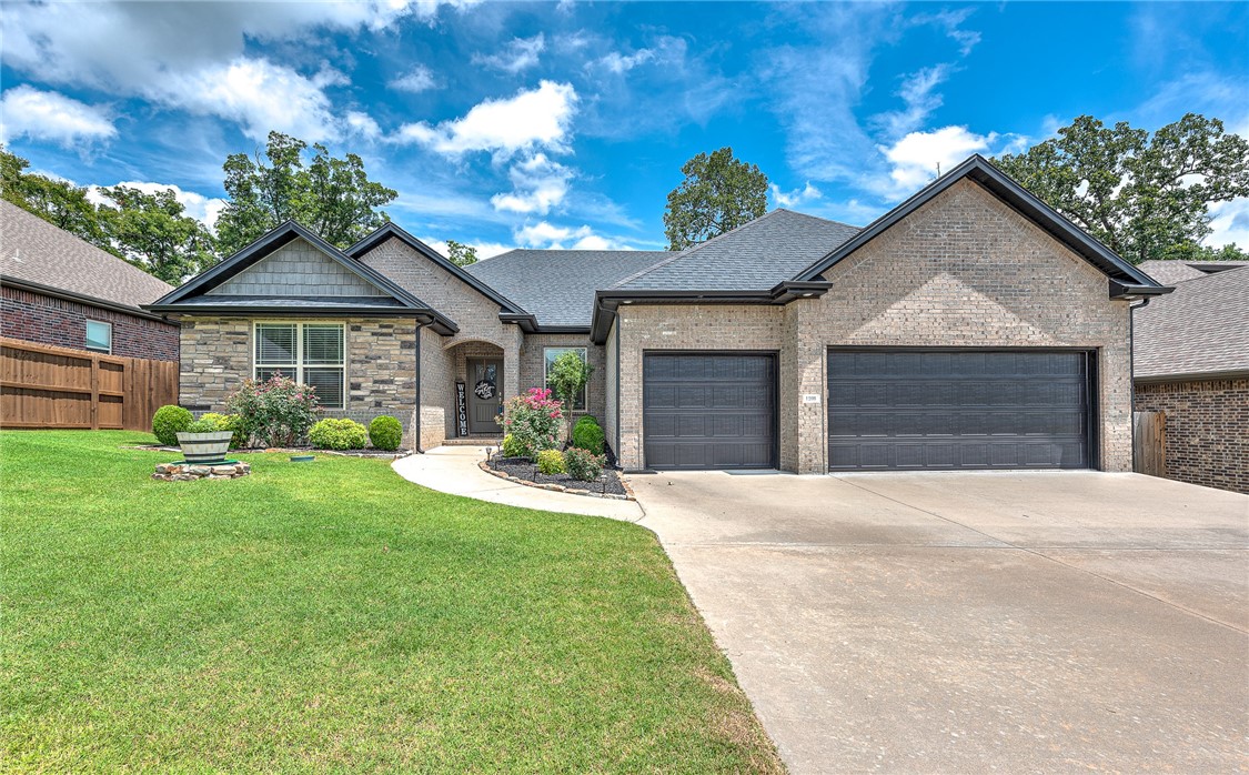 Welcome to this stunning and spacious home that truly has it all! When you walk in, you’ll be greeted by a generous and inviting living room that seamlessly flows into a gorgeous, oversized covered deck, complete with a cozy outdoor fireplace, and a screened in porch. The kitchen has a hidden pantry, and the sellers converted the dining area to a playroom. Whether you're hosting gatherings or enjoying quiet family evenings, this space is perfect for creating memories all year round. Designed with both comfort and convenience in mind, this home features a desirable split floor plan that offers privacy and functionality for every member of the household. Nestled right in the heart of Northwest Arkansas, you’ll enjoy easy access to everything the area has to offer — top-rated schools, shopping, dining, parks, and more. This is more than just a home; it’s a lifestyle upgrade waiting for you to step in and make it your own. Don’t miss this incredible opportunity to live in one of the most sought-after locations in NWA!
