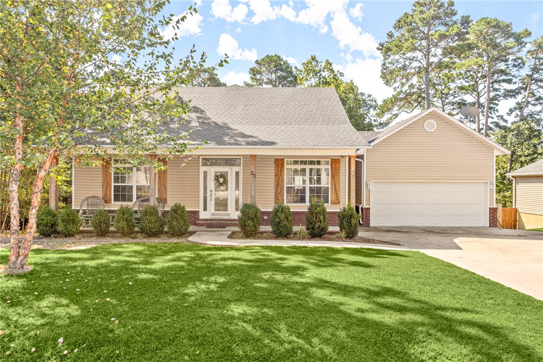 Beautiful Home in Bella Vista! Covered front porch and landscaping add to curb appeal. Living room has great natural light and is open to the eat-in kitchen. The kitchen is spacious and features abundant cabinet and workspace and has large dining space. Laundry room with extra storage. One guest bedroom on main level. Office room on main level. Large guest bath with double vanity. There is a main level Primary and Upper-Level Primary. Main level primary has access to back deck, WIC, and attached bath with whirlpool. Upstairs is large bonus room, great extra living space for the home. Upstairs primary is a great owners retreat, enjoy spacious bedroom with privacy, a huge attached bath with whirlpool tub and corner shower, along with large WIC. Great community amenities including pools, gyms, golf, lakes and easy access to many top-rated mountain biking trails! Bentonville Schools. Major renovations give peace of mind and include new roof in 2019, HVAC 2023, lifetime foundation warranty, sewer connection & more!