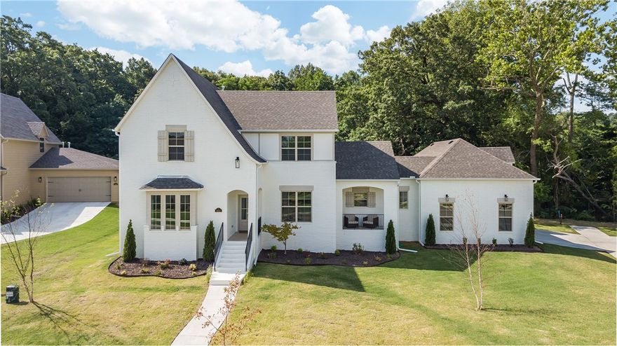 You will love this spacious, painted brick home with old world charm in the Brooklands neighborhood fully private BACKING UP TO GREENSPACE! 5 bedrooms, 3 bathrooms, plus two extra spaces from an office or movie theater room, In-law suite, game/playroom, there is so much space the possibilities are endless!! This beautiful home offers a 3-car garage. 2 covered porches, a dining room with built in cabinets and floating shelves, a free standing tub, and washer dryer connections in the Master bath & upstairs. Landscape lighting. Quick bike trail access to Centennial Park & Kessler Mt. This community offers two pools and a playground to enjoy.