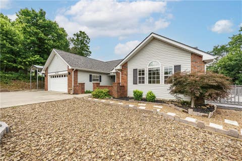 Photo of 311 Holiday Island Drive, Holiday Island, AR 72631 (MLS # 1355299)