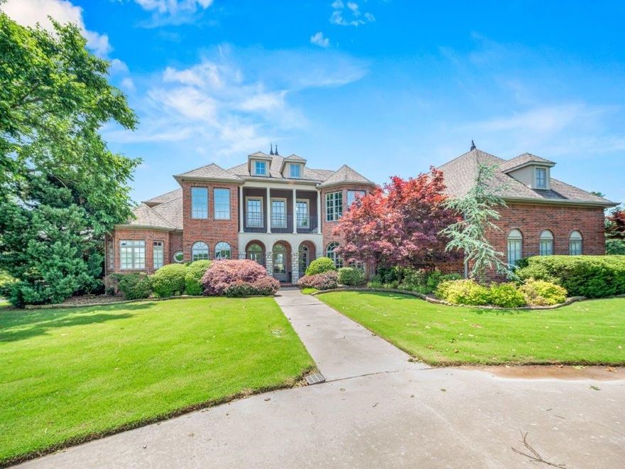 Breathtaking Talamore Estate! Boasting 4.46 Acres and a completely renovated 6,065 SF Home, this is a see to believe property. Unbeatable curb appeal with waterfront lot. Grand entry opens to a magnificent view with floor to ceiling windows in grand room. Access to the massive patio with pond view, the perfect entertaining setup. Interior space boasts amazing natural lighting, marble and hardwood floors, vaulted ceilings & more! The eat-in kitchen & hearth room is the heart of the home, abundant cabinet storage, gas range & built-in fridge. Master suite on main has private patio access, fireplace, his & her closets, a spa like bath w/steam shower, a true retreat! Upstairs is a covered balcony accessed from gorgeous home office. Large guest suite w/attached bath. Two additional guest rooms w/J&J Bath. Massive media room & wet bar. Spiral staircase to third level bonus room. Large 3 car garage. Impeccable layout, completely remodeled, all in a highly sought after location & neighborhood.