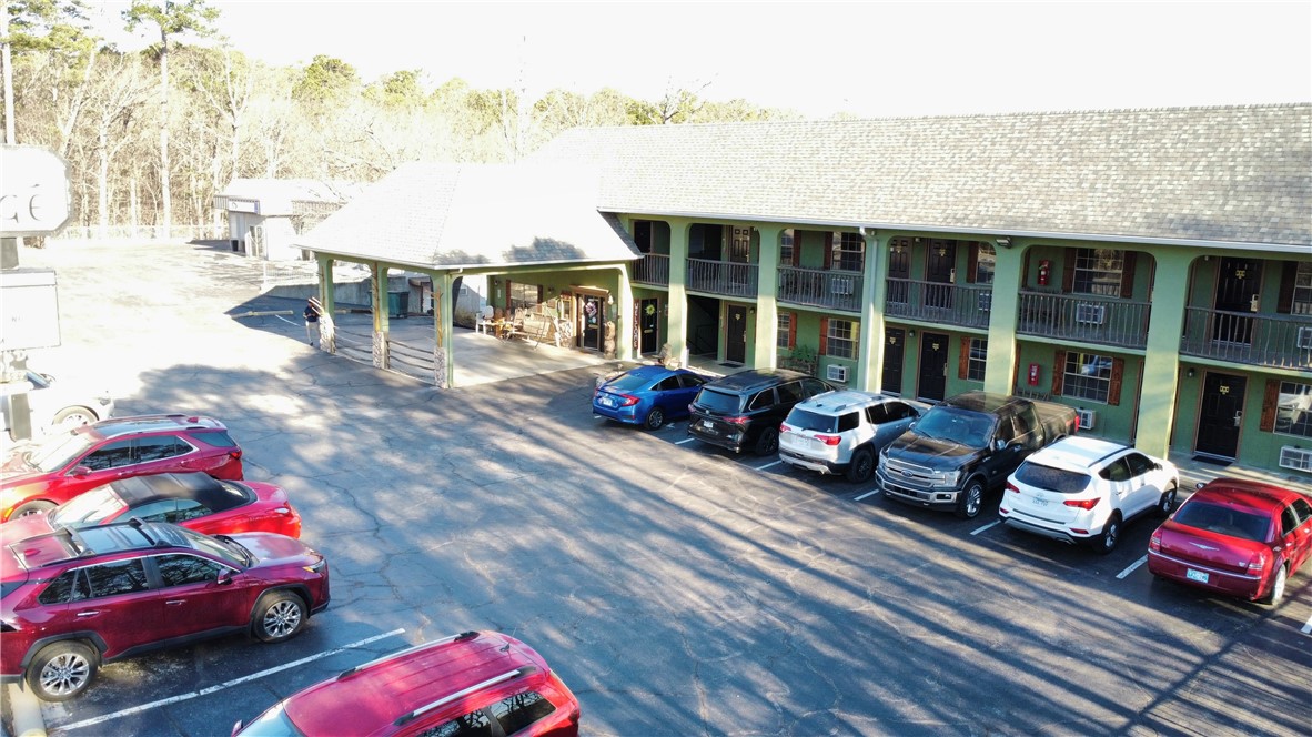 Well established business minutes to historic downtown Eureka Springs. Prime location, investment opportunity, meticulously maintained in popular tourist and recreational destination located on 1.22 acres. Annual income $193,255 with annual expenses ~$137,298. Spacious 2 bed 2 bath owner/manager living quarters. 7 King rooms, 3 Jacuzzi King rooms and 13 Double queen rooms. Financial details available to qualified buyer. On site viewings must be coordinated in advance as this is a 'working business.' Proof of funds or Financial Institution letter of qualification. Spacious 2 bed 2 bath owner/manager living quarters. 7 King rooms, 3 Jacuzzi King rooms and 13 Double queen rooms. Financial details available to qualified buyer. On site viewings must be coordinated in advance as this is a 'working business.' Proof of funds or Financial Institution letter of qualification.