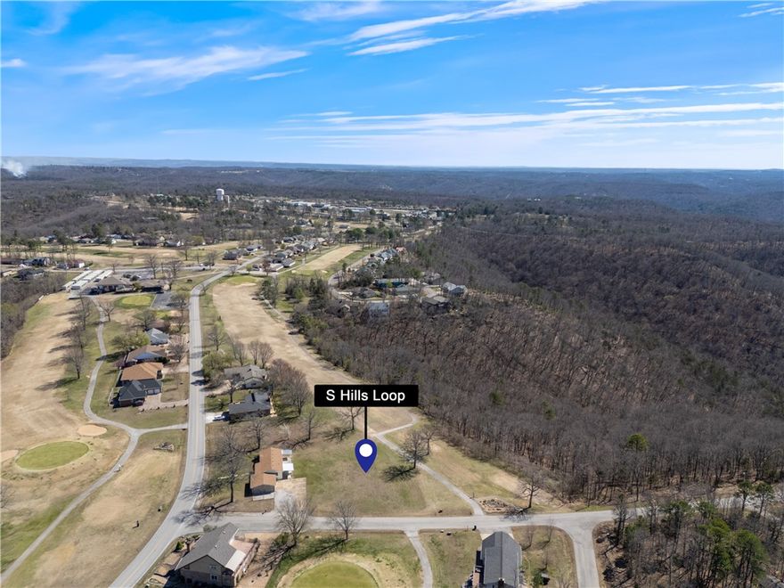 Build Your Dream Home on the Golf Course! This prime lot is located on the beautiful 18-hole golf course in Holiday Island, Arkansas, right beside tee box #9. Offering a stunning setting with scenic views, this lot is perfect for building your dream home or vacation retreat. Enjoy an unbeatable location just 10 minutes from historic downtown Eureka Springs and close to incredible outdoor activities, including mountain biking at Lake Leatherwood. With easy access to local amenities, shopping, and dining, this property offers both relaxation and adventure. Whether you're an avid golfer, nature enthusiast, or simply looking for a peaceful getaway, this lot provides the perfect opportunity to create the home you’ve always wanted. Don’t miss this chance to own a piece of paradise!