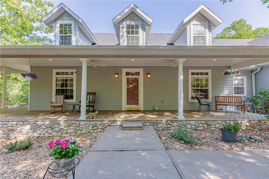 Tranquil setting at the end of a cul-de-sac. Surrounded by 4.48 acres. Relax on the covered front porch. Beautiful interior. Real 3/4 in wood floors. Open floor plan. Great kitchen with breakfast nook and formal Dining Room, extra built-ins with wine rack and a china display cabinet. Appliances were replaced in 2018. Great walk-in pantry. Spacious master suite with door to the deck, large walk-in closet, double vanities, walk-in shower. Office on main floor. Fabulous sunroom with new windows. There is a bonus room and a bedroom with a bath on the second level. Great attic storage...if you need extra space, you could convert this area for more room. New Trane HVAC with programable thermostat. The water heater was new in 2017. Whole house circulating water. Oversized 3 car garage w/extra storage. 5 different types of 220 plugs. 10X20 concrete slab in the crawl space for extra storage. Deck has been sprayed & ceiled. New roof in 2023. Located close to the Branchwood Rec. Center and Golf.