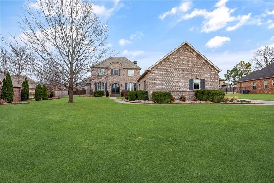 Nestled in the prestigious Enclave subdivision, this impressive 4-bedroom, 3-bathroom residence showcases three expansive living areas, an office space, 3/4 inch oak hardwood floors, 12” crown molding, and premium features and amenities. The kitchen is a chefs dream being recently renovated. The primary suite boasts a sitting area and dual bathrooms, each with walk-in closets, while abundant storage is available throughout. Upstairs, you will discover the third living area, two bedrooms, and a Jack-and-Jill bathroom. This location offers unparalleled convenience, situated 10 minutes from the NWA Mall, 30 minutes to downtown Bentonville, and 10 minutes to Tyson headquarters!