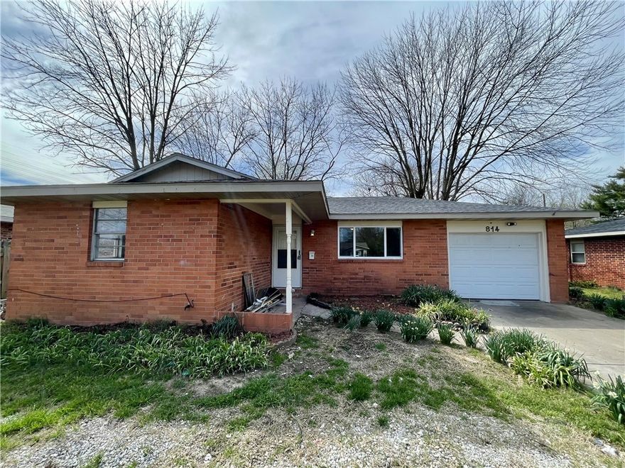 Charming 3-bedroom, 1-bath home offers comfort, functionality, and value! Inside, you’ll find a spacious living room, an updated kitchen featuring a gas range with vent hood, and a convenient utility area. The bathroom includes abundant tile, a dual-sink vanity, and a tub/shower combo, providing both style and practicality. The home also features a 1-car garage, brick exterior, covered front porch, and attractive landscaping. Step outside to enjoy a fully fenced backyard, perfect for relaxing or entertaining, along with a storage building for extra space. Ideally located just about a mile from J.B. Hunt Park, you’ll have easy access to ball fields, play structures, disc golf, and scenic bike and walking trails that connect to Lake Springdale, a pump track, and the Razorback Greenway. All of this in a convenient location at a great price point—don’t miss this opportunity!