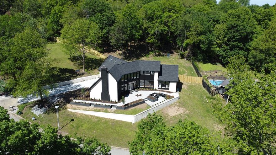 Completely Renovated on Mt Sequoyah! This perfect location on Mnt Sequoyah is waiting for you! Fully updated with that next level modern touch. New roof & gutters, new driveway, Tesla charging station, new white oak floors, new ducting, new electrical wiring, new plumbing, HVAC unit #1 brand new, HVAC unit#2 just serviced, new tankless water heater, all 4 bathrooms completely renovated, , new Samsung appliances, imported Spanish tile backsplash and new fixtures & hardware throughout are just some of the renovation highlights (check attachments for complete list). Don't forget the 250sqft finished loft space perfect for the kids!! The location and the quality renovation makes this an amazing option where you can make the heart of Fayetteville your forever home. Book your private showing today! Showings Start Saturday, May 5th