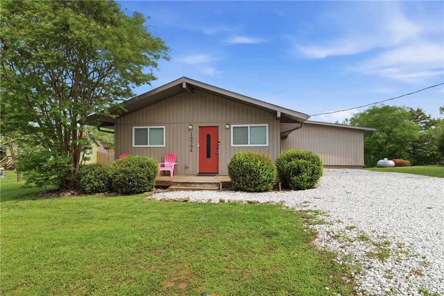 This Beaver Lake property has it all! A furnished and renovated home, boat slip with lift, hot tub, year-round lake view, short drive to downtown Rogers, and a community beach area with boat launch a few blocks away. Perfect for a family lake home, investment property or both. It's currently used as a short-term rental and has exceptional reviews on Airbnb/Vrbo. Enjoy lake like to the fullest with the ~10'x30' boat slip with 8,000 lb lift in the community dock and the Jacuzzi smart hot tub with easy lift cover. Home was completely renovated down to the foundation in 2018 with modern, high-end finishes. The 16'x40' detached garage with 9' tall door offers ample storage for a boat, trailer, jet skis, and lake toys. More storage is available in the shed. Community boat dock, 2 community boat launches with swim area, and Hwy 12 boat launch are just a few blocks away. Only 9 minutes to Prairie Creek Marina and 14 minutes to downtown Rogers. Property may be sold without the boat slip and hot tub for a reduced price.