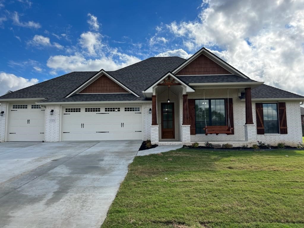 Beautiful new construction home with all the bells and whistles. 4 bdrm, 2 bath, 3 car garage home with porch swing on the porch. Large spacious kitchen with large island. Master bath has a large walk in shower and two separate vanities. This home is a must see and won't last long.