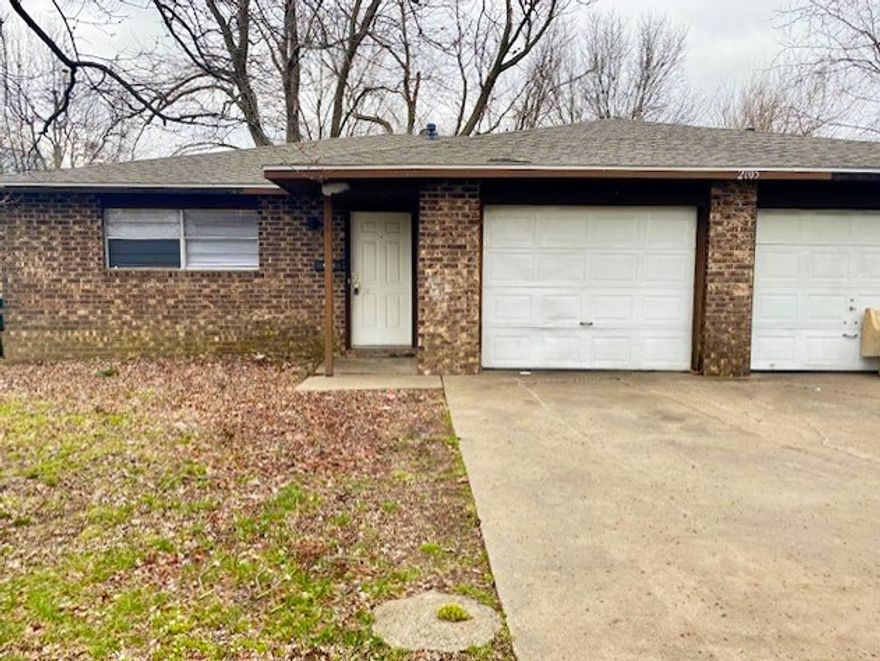 Quaint 2 bedroom duplex with fenced in backyard! Kitchen comes with oven/range and refrigerator. Tenant responsible for electric, gas, water/trash, cable/internet, yard maintenance, washer, and dryer. Applications to be completed on www.nwarealtypm.com. We process applications as we receive and once an application is approved, we reach out for deposit. Deposit secures the unit not the application. Please be aware of scams. Our application process is to be paid online through a secure portal, and we do not accept cash, CashApp, Venmo, and/or PayPal. Pictures are of like unit - same layout, finishes may vary.