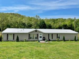 Really nice 4 bedroom double wide built in 1998. Beautiful property right off Hwy 62. Nice updates inside home including a remolded master bath. This beautiful remodeled home sits on a gorgeous 7 acres with a line feed pond. Don't miss out on this amazing property!