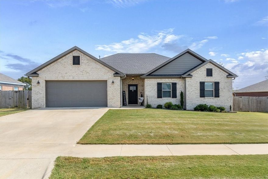 Fall in love with small-town living at its finest in this beautifully maintained and thoughtfully cared-for all-brick home, perfectly positioned near Prairie Grove’s Aquatic Center and Historic Downtown Main Street! With $2,500 toward buyer’s closing costs and prepaids included, it’s the perfect start to your next chapter in Prairie Grove. Bright, open spaces flow effortlessly from the welcoming living room with a cozy gas fireplace to the dining area and well-appointed kitchen designed for everyday living. The desirable split floor plan offers a private primary suite with dual vanities and a walk-in closet that connects conveniently to the utility room, while two additional bedrooms share a spacious second bath. Unwind on the covered deck that invites easy outdoor living, from quiet mornings to laid-back evenings with friends. A place where comfort meets convenience—ready for you to call home!