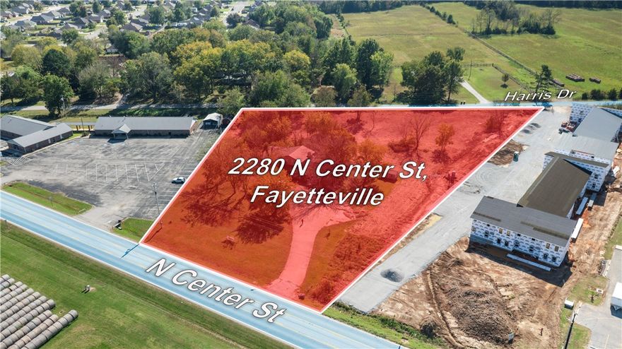 Excellent Development Opportunity! 2.5 flat acres with dual road frontage—160' on Hwy 16/N Center St
and 445' on Harris Dr-offering great visibility and access. Existing 3-bedroom, 2-bath structure currently operates as office/R&D Warehouse, The property is ideal for commercial redevelopment for QSR, Restaurants, Strip Center, office spaces, or Multi Family.  Endless potential for investors.  Currently zoned residential within Elkins City. 

See Commercial listing MLS#1626025 and also Residential listing MLS #1626233
