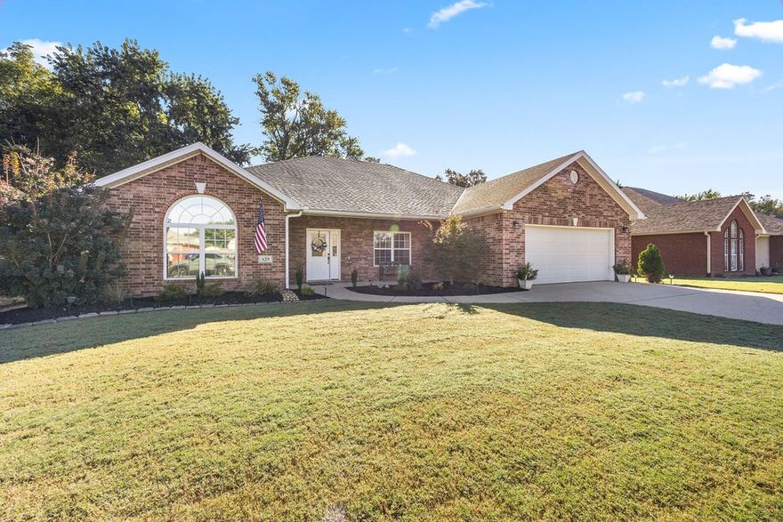 Amazing location, one level, 4 bedrooms, 2,287 sq/ft, all brick, & a private back deck that overlooks greenspace. Plus is located less than a mile from I-49  & only 5 minutes from the JB Hunt Headquarters. What more could you ask for? This 4-bedroom, 2-bath home is spacious & well-appointed, featuring oversized bedrooms, a formal dining area, & a split floor plan. The home has several modern updates, from the beautifully landscaped front & backyard to the updated painted cabinets & hardware.  Several rooms have been freshly painted, & you will love the engineered hardwood floors throughout, with no carpet. The living room contains a beautiful gas fireplace & is pre-wired for an entertainment surround sound! The back deck has been recently rebuilt and stained. You will enjoy the private canapé set-up overlooking the greenspace with no neighbors behind you. The backyard has a fire pit to enjoy those cold fall evenings. This house will not last long, so come & fall in love with your new home before it's too late!