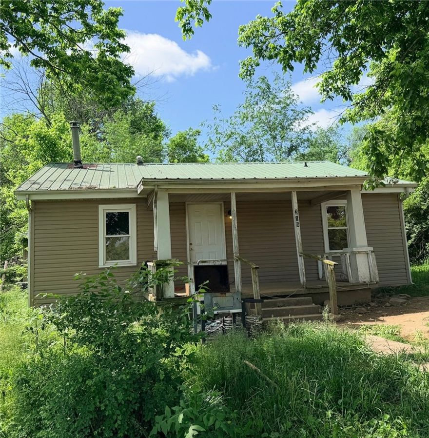 3 bd 1 ba home in Yellville close to school and nursing home. Detached garage with carport. Both home and garage have metal roofs. Yellcott internet receiver will convey. Shelves in living room and dog pen outside do not convey. Home will not go VA, FHA or RD. Selling AS-IS; all numbers approximate.