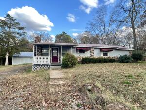 Lying on over an acre lot on the outskirts of Dover, you'll find this charming 3 bedroom home, and 28x40 workshop. To help with your payments or simply need additional living space, there is a separate 1 bedroom 1 bath guest quarters with garage. With an updated kitchen and bathroom, newer plumbing, HVAC and water heater, it's ready for new owners to make it their own!