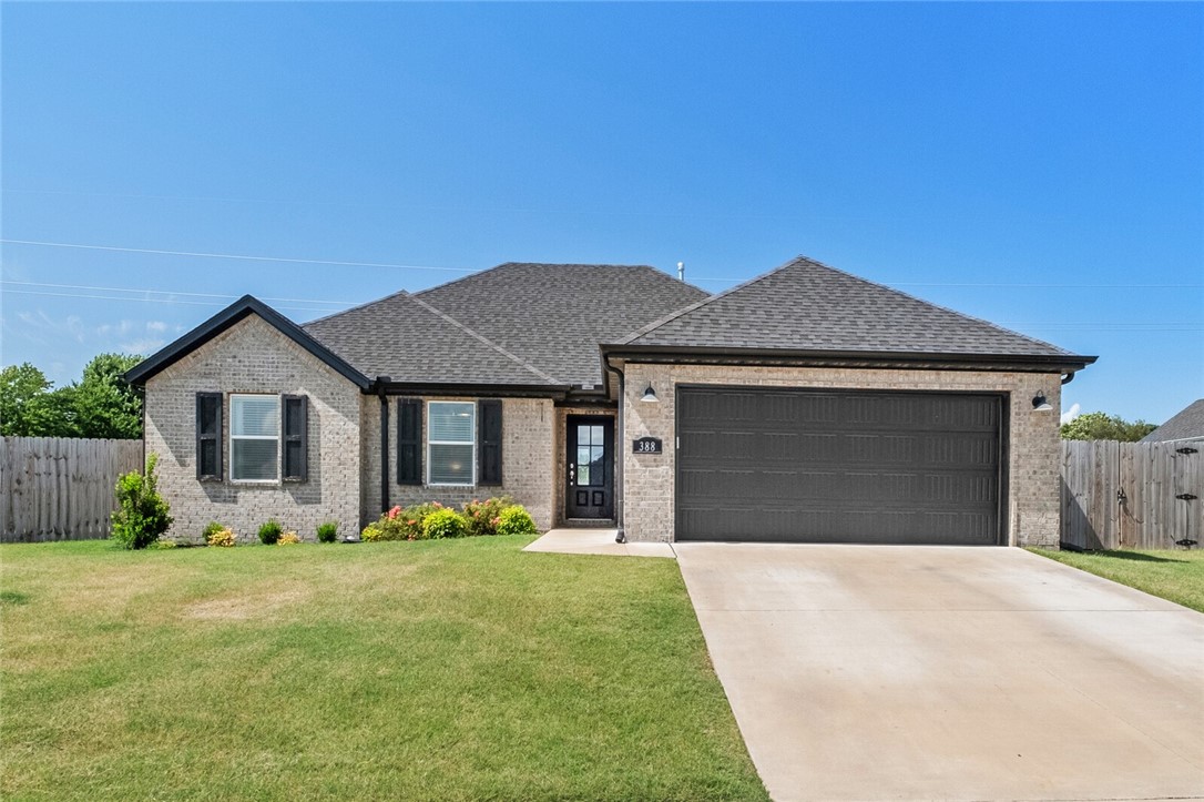 Welcome to this charming 3-bed, 2-bath home located in the Goose Creek Subdivision. The spacious living room features vaulted ceilings and is filled with natural light, creating an open and inviting atmosphere. The eat-in kitchen includes stainless steel appliances, an extended pantry, and a black undermount single basin silgranit sinkāperfect for everyday living and entertaining. The primary suite offers a private en-suite bathroom that includes both a soaking tub and a separate shower, plus two walk-in closets. Two additional bedrooms are located on the opposite side of the home along with a large secondary bathroom. Additional highlights include two hallway closets for extra storage, a well-sized laundry room, and a 2-car garage. Enjoy the outdoors with a covered back porch and a backyard that backs up to a fieldāoffering added privacy. This cozy home combines style, space, and comfort in a great locationādonāt miss your chance to make it yours!