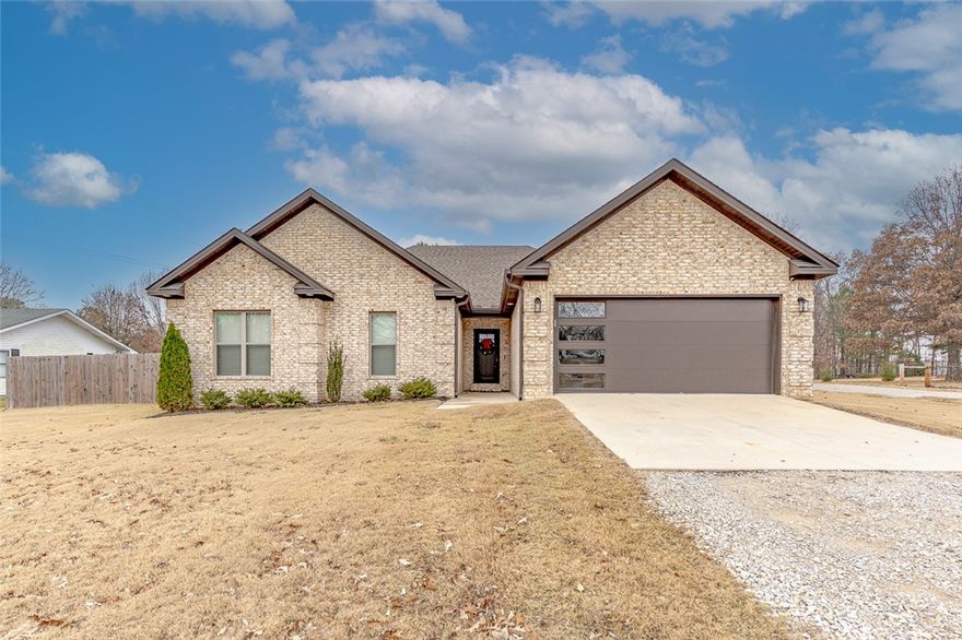 Welcome to this charming 3-bedroom, 2-bath home located at 4913 Highway 351 in the highly sought-after Brookland School District. This 1,829 sq ft property sits on a generous 0.73-acre lot, offering plenty of space and privacy. Inside, you’ll find a warm and inviting living room featuring beautiful exposed wood beams and a cozy fireplace that creates the perfect gathering space. The home’s layout is comfortable and functional, with spacious bedrooms and ample storage throughout. Step outside to enjoy the large fenced-in backyard, ideal for pets, play, or outdoor entertaining. With its peaceful setting and convenient location, this home offers the best of both comfort and country living—just minutes from Jonesboro amenities.