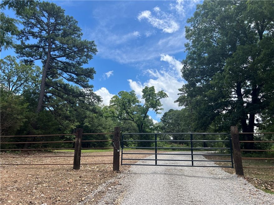 Location, Location, Location!  Rare opportunity to own 55.75 acres of quality developable property with 1/3 mile frontage on Hwy 23.  Amenities include grocery shopping, restaurants, banking, hardware, fire and police protection, gas, a convenience store and more are located next door.  Only 5 miles to Eureka Springs and 4.5 miles to the Holiday Island Marina.  Mixed topography with flat pasture, flat wooded areas and many outstanding rock outcroppings.  Incredibly south-facing views including Lake Leatherwood.  The perimiter is mostly fenced with roads throughout the property (some require 4WD) There is a 32 x 20 metal building and carport and electric is available on property.  This is an awesome opportunity for development or to build your own country estate "in town."