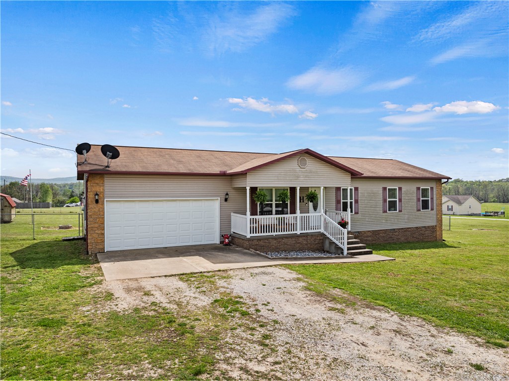 First-time homebuyer's dream home! 4 bedrooms, 2 baths on 1 acres with a fenced backyard. ALL the interior updating has been done. Beautifully painted cabinets, granite counters with subway tile backsplash in the spacious kitchen. Bathroom vanity and flooring updates with new LVT hardwood look flooring throughout. The outdoor space is perfect for entertaining and the family pets. Between Bellfonte and Hwy 7 South just off Hwy 206 makes it convenient to work and schools. Just a bit of gravel road to the driveway.