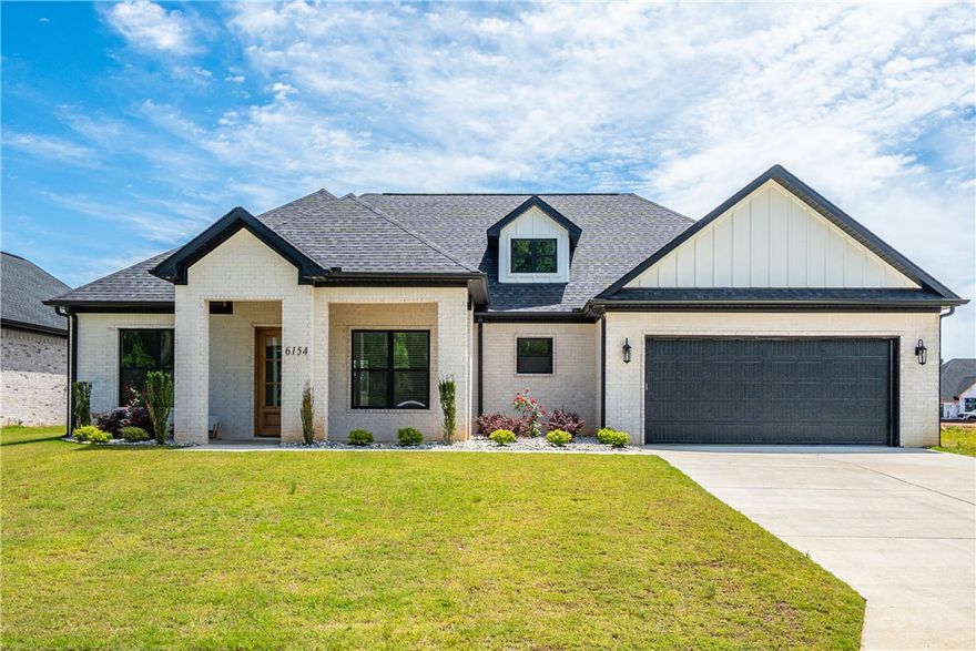Discover luxury lake area living in the highly sought after Severn Landing subdivision, adjacent to beautiful Hurricane Lake! This gorgeous newer custom built home offers the perfect blend of elegance, comfort, and functionality with 3 bedrooms, 2.5 bathrooms, and a thoughtfully designed open concept split floor plan. The spacious living area flows seamlessly into the stunning kitchen featuring quality finishes, abundant cabinetry, and a large walk in pantry, perfect for everyday living. A dedicated office provides the ideal work from home setup, while the oversized laundry room offers exceptional storage and convenience. The private primary suite is a true retreat, complete with a spa like bathroom featuring a large soaking tub, oversized walk in shower, and an impressive massive walk in closet. Step outside to enjoy the large backyard with a privacy fence, a covered patio area, perfect for relaxing evenings, outdoor gatherings, or enjoying the peaceful surroundings.  This home is ready to welcome its next owners!