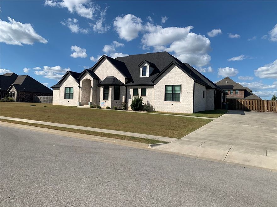 Beautiful custom build located in Elmdale Lake Estates that sits on half an acre. Walk into this home, and you will find 17' cathedral ceilings with handcrafted wood beams, a brick gas fireplace that has shiplap to the ceiling in the living room, and a foyer with beams and accent wall. Office with glass doors or playroom. There is a 9' island in the kitchen along with a shiplap wall in the dining area. Enter the primary suite and you will find a shiplap wall and barn door that leads you to the large primary bath. You will also find a walk-in tiled shower with two shower heads along with a huge closet that contains a built-in central island and bench. Downstairs, you will also find 2 other bedrooms with a Jack and Jill bathroom. Walk upstairs to the in-law suite with a bonus room. The attic is floored to allow for storage. The garage is 24' deep with insulated doors. There is a large, covered patio with a brick gas grill and a backyard that is very spacious.