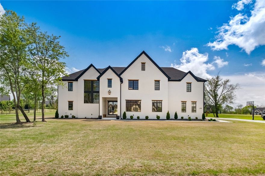 Stunning less than two year old custom built home in exclusive Westend neighborhood, only 11 minutes from downtown Bentonville. The entertainers kitchen with waterfall quartzite island, GE Cafe appliances, and living room open up to a large outdoor patio and room to roam in the backyard. Upstairs features an oversized media room, three bedrooms and an unfinished 800+sqft for a buyer to finish out with their custom design. Master features an oversized closet, double vanities with Verona quartz, sitting area for makeup, pass through for laundry, and center island with storage. Epoxy floors in a split 3 car garage, sprinkler system, and wired for sound. Public Open House May 4th and 5th.