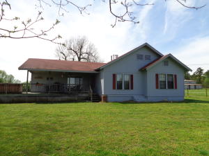 IF YOU WANT TO BE CLOSE TO TOWN [2 MILES FROM WAL MART, AND LIVE ON A SMALL FARM, THIS IS THE SPOT. A 3 BEDROOM & 2.5 BATH HOUSE, AN IN-GROUND POOL, HORSE STABLES, A LARGE DETACHED, DRIVE THRU GARAGE, IS JUST PART OF THE AMENITIES. AND, THE LAND & PRIVACY IS WONDERFUL. YOU BETTER GRAB THIS ONE QUICKLY. THIS IS PRICED TO SELL VERY FAST....ONLY $159,900. MLS#19-775.