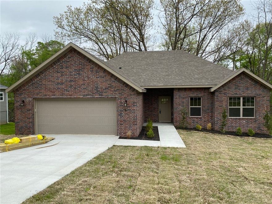 New construction home in Bella Vista ready to call your own!  Home has an open and split floorplan with living space between where you can cozy up to the fire or enjoy an evening on the deck.  Home features eat in kitchen, walk in pantry and plenty of storage.  Master bath has a large walk in closet, walk in shower and double vanity.  Quick, easy access to the new Bella Vista bypass.
