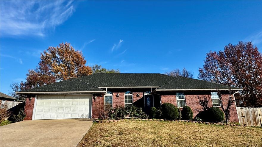 Featuring new windows, a new front door, freshly painted kitchen cabinets, wood flooring, and a roof replaced in 2025. The home also offers a large backyard with a privacy fence.