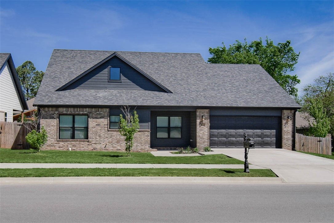 Beautifully maintained like-new 3 bedroom, 2.5 bath, 2 car garage brick home conveniently located in Farmington near schools, shopping, local parks, and just minutes from I-49, the University of Arkansas, & Centennial Park. Open concept living with LVP flooring throughout main traffic areas; eat in kitchen has a generous pantry, all stainless appliances, gas cooking, & quartz counters. Garage enters to a spacious laundry room that has cabinets, a huge storage closet with built in shelves, folding counter, & exterior door that exits to a covered porch and new deck. The primary suite features a bathroom with dual sink vanity, soaking tub, walk in shower, and enormous walk-in closet with built in shelves. Upstairs there are two additional oversized bedrooms with large walk-in closets and a shared Jack & Jill style bath. The backyard is privacy fenced; there is also a new deck off the kitchen in addition to the new deck off the laundry area. Motivated seller is willing to give up to $5000 in buyer concessions.