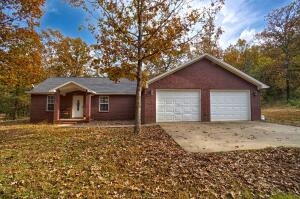 If you are looking for something close to town yet out of town this one may fit the bill. The home is just over 1900 Sq feet with three bedrooms, two baths, open kitchen dinning, tons of storage, huge pantry and a split floor plan. The garage is oversized and has extra storage. Outside there are 12 secluded wooded acres. There is nothing else like this one for sale so don't wait!